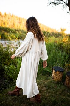 Our quintessential and loved cozy dress. Made with 100% raw silk and sewn with cotton thread. Color: un-dyed natural creme. One size fits most. Wash warm and tumble dry to soften. (don't hang dry!) Flowy Beige Cotton Midi Dress, Cream Flowy Cotton Midi Dress, Flowy Cream Cotton Midi Dress, Cream Daywear Dresses For Fall, Cream Dresses For Daywear In Fall, Beige Linen Long Sleeve Dress For Fall, Bohemian Beige Long Sleeve Linen Dress, Bohemian Linen Dress For Daywear In Fall, Bohemian Fall Loungewear Dresses