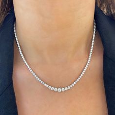 Heads are sure to turn when wearing this exquisite tapered diamond tennis necklace. This opulent arrangement of diamonds set in gold glistens beautifully against the skin. We know you'll fall in love with it! Metal: 14k White Gold / 14k Yellow Gold / 14k Rose Gold Round Brilliant Cut Natural Diamonds: Approx. 7.49 ctw G Color and SI1-2 Clarity Diamonds Length: 16 inches Closure: Box Clasp Looking for a different length? Please email us. Delicate Diamond Necklace, College Rings, Diamond Tennis Necklace, Pearl And Diamond Necklace, How To Make Rings, Expensive Jewelry, Band Bracelet, Bridal Bands, Jewelry Lookbook