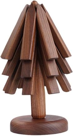 a wooden christmas tree on a white background