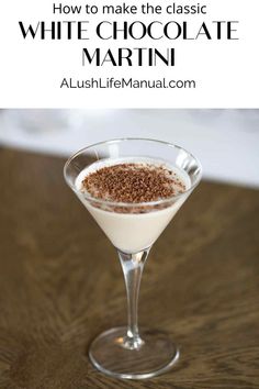 white chocolate martini in a coupe glass with cinnamon sprinkles on the rim