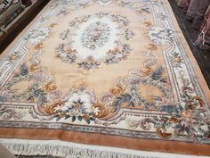 This Chinese rug hand knotted in China with very good quality wool in the 1980's the rugs which were made in the 80s they have much superior quality than the one made later on this rug is in excellent condition   size 9'×12' this rug never been used the color in this rug is peach background with beje border this rug is over 100 pounds indication of very high quality wool the wool is very soft  ' Persian Rug Orange, Chinese Art Deco Rug, Peach Background, Chinese Art Deco, Chinese Rug, Asian Rugs, Art Deco Rugs, Antique Caucasian Rug, Floor Rugs