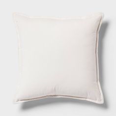 a white pillow on a gray background