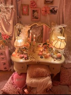 a vanity with candles and decorations on it