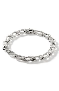 Linked loops of sterling silver compose this handsome chain bracelet highlighted by pavé diamonds at the center. Total diamond weight: 0.18ct. Color: IJ Clarity: I1 Sterling silver/diamond Imported >Diamond Guide Formal Silver Chain Bracelet With Pave Setting, Formal Diamond Bracelet With Chain, White Gold Chain Bracelet For Anniversary, Sterling Silver Chain Bracelet With Diamond Accents For Anniversary, Silver Chain Link Diamond Bracelet For Formal Occasions, Silver Chain Bracelet With Pave Setting, Elegant Silver Chain Bracelet With Single Cut Diamonds, Fine Jewelry White Gold Chain Bracelet With Pave Setting, White Gold Chain Bracelet With Pave Setting Fine Jewelry