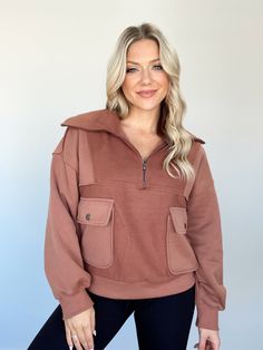 Indulge in luxury with our Zip And Zen Pullover. This elevated piece features a collared neckline, quarter zip, and zipper closure for both style and convenience. The patchwork design and pocket details add a unique touch, while the relaxed fit and soft, stretchy fleece provide ultimate comfort. Perfect for lounging, running errands, shopping, or brunch, this versatile pullover is a must-have for any wardrobe. Complete with a stretchy elastic hem and raw hem detailing, stay warm and on-trend wit Winter Half-zip Tops With Pockets, Collared Tops With Zipper Closure For Fall, Fall Half-zip Outerwear With Side Pockets, Half-zip Outerwear With Kangaroo Pocket For Fall, Fall Half-zip Outerwear With Kangaroo Pocket, Crochet Clothing, Patchwork Designs, Pocket Detail, Dresses Xs