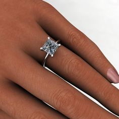 Kenya, oh heyyyyy Kenya. She has clean lines and is perfect for stacking against any style wedding band. This sleek ring features a colorless 2.5 carat princess cut (square) NEO moissanite at the center. Also available in 14k white or rose gold, also platinum. We have some squares coming in this week, once they arrive we will do a video and share on Instagram, and add the link here, so you can see how beautiful they are. But I warn ya, once you see one, there's no turning back. ;) Check it out - Stacked Princess Cut Wedding Rings, Princess Cut Wedding Rings, Engagement Ring Square, Wedding Rings Princess Cut, Princess Cut Moissanite, Ring Square, Moissanite Ring, Moissanite Rings, Style Wedding