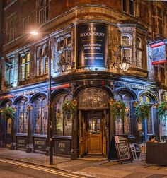 the bloomsbury hotel in london is lit up at night