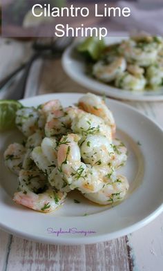 shrimp scamps with dill and cilantro lime sauce on a white plate