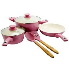 pink pots and pans with wooden utensils