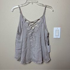 Astr The Label Lace Crisscross Sparkle Cami Size M Nwt Color: Taupe Purchased At Nordstrom Casual Cross-tied Tops For Spring, Beach Cami Top With Crisscross Straps, Spring Chic Crisscross Tops, Chic Crisscross Tops For Spring, Spring Cross-back Tops For Day Out, Spring Cross Back Top For Day Out, Cross Back Top For Day Out In Spring, Casual Sleeveless Cross-tied Tops, Casual Cross-tied Tops For The Beach