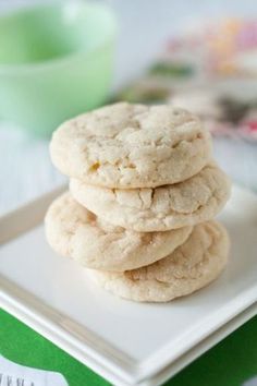 a stack of cookies sitting on top of a white plate