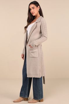 Spend the chilly season cozied up in the Lulus Cozy Effect Taupe Cable Knit Duster Cardigan! Soft and chunky knit shapes this ultra-comfy sweater that has long, cable-knit sleeves and a matching pattern of cable knit at the back. Collared neckline has notched lapels, atop a longline, duster-style bodice with two functional pockets, belt loops, and a tying sash belt. Fit: This garment fits true to size. Length: Mid-calf length. Size medium measures 40.25" from shoulder to hem. Bust: Great for any Knit Duster, Matching Patterns, Comfy Sweater, Duster Cardigan, Sash Belts, Sash Belt, Knit Sleeve, Comfy Sweaters, Long Cardigan