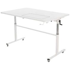 a white computer desk with wheels on the bottom and one leg raised up to it's side