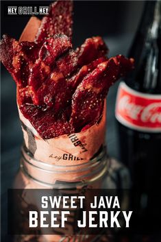 sweet java beef in a jar next to a coke bottle and glass with the words sweet java beef on it