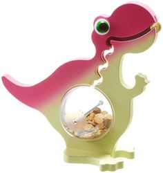 a pink and yellow dinosaur shaped object with a glass ball in it's mouth