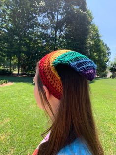 Super comfy rainbow crochet bandana! The slightly tempered colors make this rainbow easy to style, and the 7" tie strings make it adjustable and easy to wear. The perfect accessory to add some flair to any outfit! Colorful Adjustable Crochet Hat, Colorful Adjustable Casual Crochet Hat, Casual Adjustable Colorful Crochet Hat, Casual Colorful Adjustable Crochet Hat, Trendy Multicolor Knitted Crochet Hat, Adjustable Multicolor Hippie Crochet Hat, Multicolor One Size Crochet Hat Casual, Multicolor Crochet Hat For Festival, One Size, Adjustable Hippie Crochet Hat