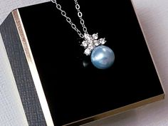 Wedding Light Blue Pearl Sterling Silver Cubic Zirconia Dainty Bridal Pendant Necklace with .925 Sterling Silver Chain. CHAIN is 18 inches (45.7cm) long. PENDANT is about 0.55 inch (1.4cm) long including bail. BRIDAL NECKLACES SECTION: https://www.etsy.com/shop/LanaChayka?ref=seller-platform-mcnav§ion_id=11638944 JEWELRY SETS SECTION: https://www.etsy.com/shop/LanaChayka?ref=seller-platform-mcnav§ion_id=18873488 BRIDAL JEWELRY SETS SECTION: https://www.etsy.com/shop/LanaChayka?ref=seller-platfor Elegant Light Blue Jewelry For Gift, Elegant Light Blue Necklace For Anniversary, Elegant Light Blue Necklaces For Gifts, Light Blue Jewelry For Wedding, Elegant Light Blue Jewelry For Party, Blue Pearl Pendant Jewelry For Wedding, Formal Blue Necklace With Pearl Pendant, Elegant Blue Necklace With Pearl Pendant, Formal Blue Jewelry With Pearl Pendant