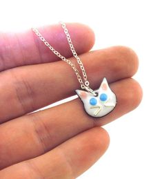 Cat Necklace,  glass enameled cat pendant by Kathryn Riechert Metal Jewelry With Cat Design, Metal Cat Design Round Jewelry, Cute Round Cat Design Jewelry, Cute Cat Design Round Jewelry, Cute Cat Design Jewelry, Cute Metal Jewelry With Cat Design, Novelty White Sterling Silver Jewelry, White Sterling Silver Novelty Jewelry, Blue Cat Design Jewelry For Gift