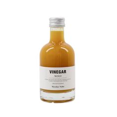 a bottle of vinegar on a white background