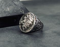 Engraved Lion Head Ring,925k Sterling Silver Mens Ring,Shiny Solid Silver Ring,Engraved Silver Ring Package: Wooden Box +Gift + Cleaning Cloth + Quote as you wish. Description The product is made of 925k sterling silver.  A perfect ring with Lion Head Zodiac Design . The best quality silver is used. It is shipped and delivered in a wooden box and with a gift. It is handmade.  Another way to make your loved ones and yourself  happy is to buy rings from us. Please Feel Free to contact us. Weight : Engraved Silver Ring, Silver Mens Ring, Zodiac Designs, Sterling Silver Mens Rings, Head Ring, Mens Silver Rings, Silver Engraving, Mens Ring, Sterling Silver Mens