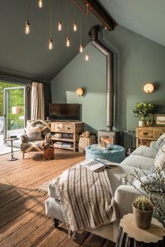 a living room filled with furniture and a fire place