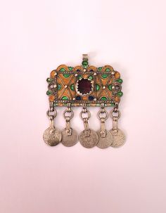 Morocco - Pendants in silver, enamel, beads and ancient coins - for necklace - South Morocco  20th century  Height: 7.5cm (2.75") Width: 6 cm (2.36") Total weight: 32.20 grams Feel free to contact me for any question about this item, I will be happy to answer you as soon as possible. Visit my Etsy Shop: https://www.etsy.com/fr/shop/TIFINAGH Réf : 51 Ornate Coin Pendant Jewelry, Traditional Coin Necklaces As Collectibles, Traditional Coin Necklaces For Collectors, Traditional Bronze Coin Pendant Jewelry, Traditional Coin-shaped Metal Jewelry, Traditional Metal Coin Jewelry, Traditional Coin Shaped Metal Jewelry, Traditional Coin Pendant For Jewelry Making, Traditional Silver Coin Jewelry