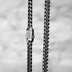 Luxurious Acetylene Black: Featuring Acetylene Black PVD plating on a 6mm 304 Stainless Steel Curb chain, our design boasts flat diamond-cut beveled links for superior shine and a comfortable, strong fit. Waterproof and Sweatproof: Designed for everyday wear, this chain is both waterproof and sweatproof, ensuring it maintains its pristine look even during active use. Tarnish-Resistant Elegance: Crafted to stand the test of time, our Cuban chain features Acetylene Black PVD plating on 6mm 304 sta Luxury Black Curb Chain Jewelry, Modern Black Stainless Steel Chain Necklace, Black Stainless Steel Cuban Link Chain Necklace, Luxury Gunmetal Chain Jewelry, Luxury Black Metal Chain Necklace, Gunmetal Stainless Steel Box Chain Necklace, Plating Techniques, Cuban Chain, Bracelet Collection