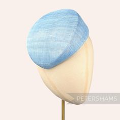 Betty is what we like to call a modern pillbox. Instead of having straight sides, this light blue hat base has a gentle slope to one side and finishes off at a slight point. It looks great positioned at many angles and is finished on the inside with a petersham ribbon edge.  Can be attached to the head with elastic, hair comb or headband (not included). Measurements: Width: 16.5x18.5cm (6.4x7.2 inches) Height at tallest ridge: 5.5cm (2.1 inches) We have hundreds of different hat bases available! Elastic Hair Comb, Sinamay Fabric, Sinamay Fascinator, Blank Hats, Millinery Supplies, Hat Base, Different Hats, Velvet Flowers, Fascinator Hat