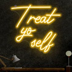 there is a neon sign that says treat you sell on the side of a wall