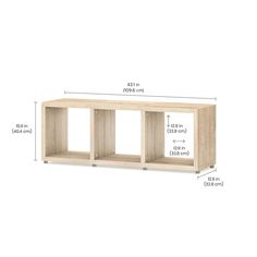 a wooden shelf with three compartments and measurements