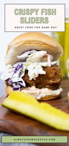 crispy fish sliders on a cutting board with pickle slices