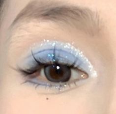 Blue Inspo Makeup, Cute Light Blue Eyeshadow Looks, French Blue Makeup, Blue Jelly Makeup, Blue Glossy Eyeshadow, Blue Sparkly Makeup Looks, Soft Blue Eyeshadow Looks, Rave Makeup Blue, Simple Light Blue Makeup