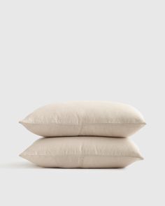 two pillows stacked on top of each other