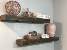 two wooden shelves with decorative items on them