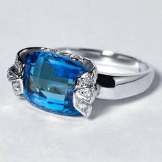 Womens Blue Topaz Diamond Gemstone Signet Cocktail Ring 14K Luxury Blue Topaz Cushion Cut Ring, Luxury Blue Cushion Cut Topaz Ring, Luxury Topaz Birthstone Ring For Formal Occasions, Fine Jewelry Blue Topaz Cushion Cut Ring, Formal Luxury Topaz Birthstone Ring, Formal Topaz Birthstone Ring In Fine Jewelry Style, Diamond-accented Topaz Ring As A Gift, Blue Topaz Ring For Formal Events, Diamond Topaz Ring With Gemstone Accents For Gift