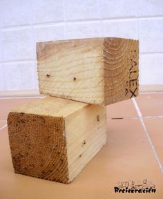 two pieces of wood stacked on top of each other