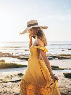 Crafted of lightweight, airy fabric in a flowy silhouette, our Belle maxi dress is the perfect summer staple for every occasion—from a beach vacation to date night or even a girls’ night out. Designed for both comfort and style, the dress features a smocked bodice, strappy back, tassel-tie waist, and of course, pockets. What do we love most about this dress? The flutter sleeves can be worn two ways: off the shoulder or as straps. Convertible flutter sleeves Smocked bodice with buttons Side on-se Pineapple Dress, Boho Chic Dress, Belle Dress, Flowy Maxi Dress, Dress Crafts, Matching Headband, Boho Maxi, Dress Purchase, Feminine Look