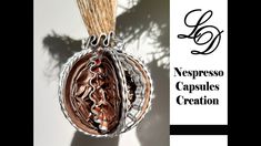 a close up of a metal object on a white background with the words espresso capillas creation