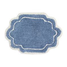 a blue rug with a white border on the bottom and an oval design in the middle