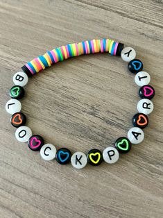 Be Magic Summer ready with these Neon NKOTB stretchy bracelets. Choose from different options to complete your Neon Magic Summer concert outfit. Letter beads are glow in the dark. Standard size is a size 7 Bracelet. Black Rave Bracelets As Gift, Black Luminous Bracelets For Gift, White Luminous Beaded Bracelets For Gifts, Fun Black Friendship Bracelets, White Rave Bracelets Gift, Adjustable White Luminous Beaded Bracelets, Fun Black Bracelets For Friendship, Trendy Neon Bracelets For Gifts, Trendy Neon Bracelets As Gift