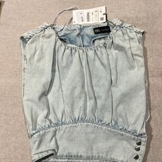 Zara Denim Top. Never Worn Chic Washed Blue Denim Top With Pockets, Light Indigo Washed Jeans For Summer, Chic Washed Denim Top For Day Out, Chic Washed Blue Jeans For Spring, Chic Dark Wash Denim Top For Summer, Chic Washed Denim Top In Denim Blue, Chic Washed Denim Blue Top, Chic Summer Denim Top, Chic Medium Wash Denim Top For Summer