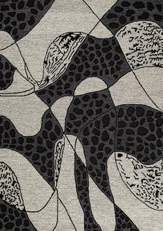 a black and white rug with an animal print design on the bottom half of it