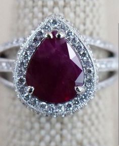 RARE***Oscar Friedman Burmese Ruby and Diamond Ring Oscar Friedman Burmese ruby and diamond ring. The ring has a 2.37 Ct. pear shape brilliant cut crown natural corundum Burma (Myanmar) ruby and 198 brilliant cut natural round cut diamonds (1.01 tcw.). Comes with an AlGL report for the ring and a GIA certificate for the ruby, Size 7 This is a remarkable beauty and is looking for a forever home!! Outstanding Christmas,  Anniversary, Engagement gift for that Special Someone!!! Please make an offer Heirloom Luxury Ruby Ring For Formal Occasions, Luxury Heirloom Ruby Ring For Ceremonial Occasions, Ruby Diamond Ring, Burmese Ruby, Gia Certificate, Ruby And Diamond Ring, Burma Myanmar, Ruby Diamond Rings, Ruby Diamond