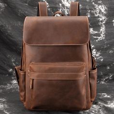 The Helka Backpack is a high-quality leather backpack designed to suit all your daily needs. Functionality and durability are paired with elegance and comfort, as this backpack provides a complete service for school, work or outdoor trips. Its easily accessible and convenient range of pockets provide you with flexibility in both outdoor and urban environments. The sleek, minimal aesthetics of this vintage leather backpack makes it ideal for men or women. The leather is all natural material, crea Soft Leather Backpack, Vintage Leather Backpack, Leather Backpack For Men, Large Travel Bag, Vintage Backpacks, Leather Rucksack, Mens Travel Bag, Dopp Kit, Crazy Horse