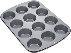 an empty muffin pan on a white background