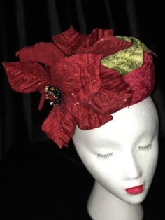 "This handmade mini pillbox fascinator hat is a wonderful accessory  to wear to Christmas parties and Holiday events.  It measures 6\" wide, 2\" high and 19\" diameter.  It is made with a buckram base covered with red crushed velvet and embellished with red velvet poinsettias and a Hat Elastic to keep it in place. The perfect Christmas Hat." Pillbox Fascinator, Velvet Christmas, Fascinator Hat, Holiday Events, Pillbox Hat, Christmas Parties, Fascinator Hats, Pill Boxes, Christmas Minis