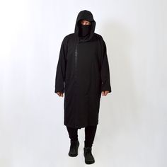 Very cool and comfortable unisex long hooded oversized coat with full zipper. Nice dense french terry fabric makes it cozy. It goes well with streetwear, gothic, punk, cyberpunk, militari, ninja, post-apocalyptic, jedi or sith styles, as easily as it fits in everyday wear. IMPORTANT! We can make a warmer version of the fabric with a fleece inside. If you want one, write to us. * 70% Cotton/ 30% Polyester. * Oversize. * Air-jet spun yarn with a soft feel and reduced pilling. * Strong overlock sea Long Sleeve Techwear Parka For Streetwear, Techwear Style Parka For Streetwear, Urban Long Sleeve Parka For Streetwear, Winter Cotton Parka For Streetwear, Black Oversized Techwear Parka, Oversized Black Long Coat Parka, Oversized Black Techwear Parka, Casual Long Coat Parka For Streetwear, Oversized Black Parka For Streetwear