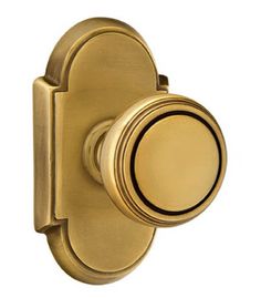 an image of a brass door handle on a white background