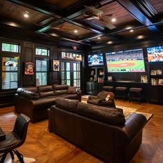 a living room filled with furniture and a flat screen tv mounted to the wall above it