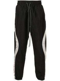 Luxury Streetwear Pants With Side Stripes, Black Drawstring Sportswear Pants, Black Tapered Leg Sweatpants With Drawstring, Streetwear Joggers With Elastic Side Panels And Tapered Leg, Streetwear Tapered Leg Joggers With Elastic Panels, Black Athleisure Parachute Pants With Drawstring, Streetwear Bottoms With Elastic Side Panels And Tapered Leg, Black Parachute Pants With Drawstring, Relaxed Fit Bottoms With Elastic Side Panels For Streetwear